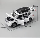 CARRO COLECIONÁVEL NISSAN PATROL BRANCO ESCALA 1:32 - GameShop Angola